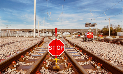 Stop sign on rail tracks